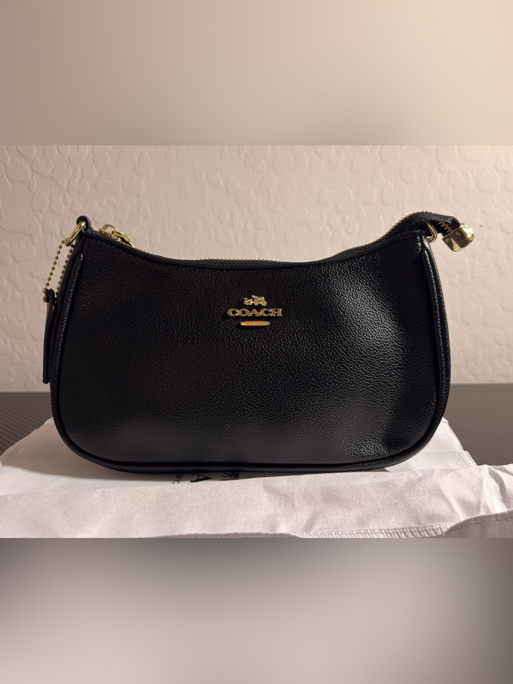 Coach Black Pebbled Leather Crescent Shoulder Bag with Gold Logo